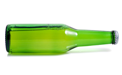 Green beer bottle in a horizontal position