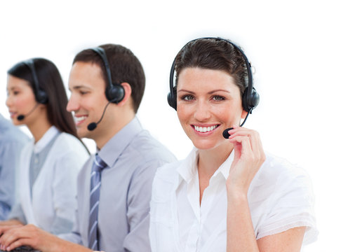 Enthusiastic customer service agents working in a call center