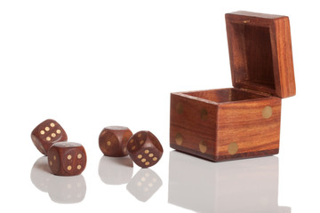 Four die and box with reflection on white isolated background