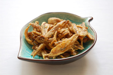 snack dried anchovies with white background