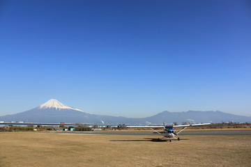 Small Aircraft with Mt.Fuji and Blue Sky