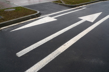 &nbsp;Asphalt road with  two opposite arrows