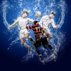 Water drops around football players under water on blue backgrou