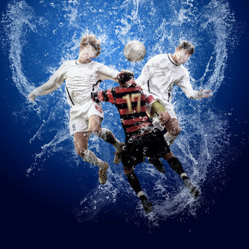 Water drops around football players under water on blue backgrou