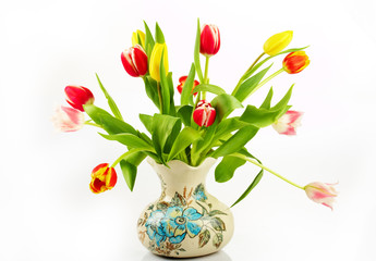 bouquet of the fresh tulips on vintage vase