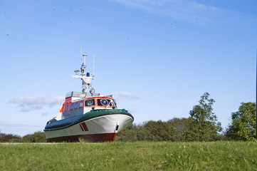 sea rescure boat in the meadow