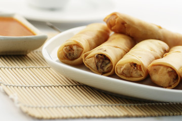 A plate of fried spring rolls