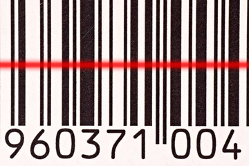 Laser barcode reader scanning a bar code