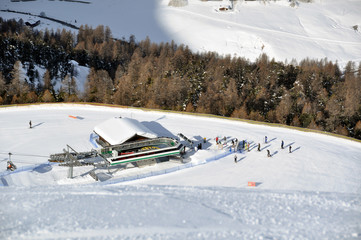 View down ski slope on chairlift station