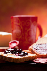 Healthy and nutrient breakfast: toast with butter and jam