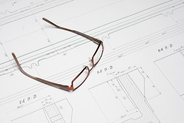 Glasses on the blueprint
