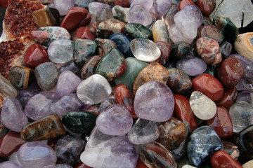 a close up of colorful polished pebbles