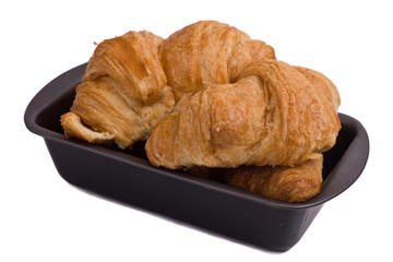 croissants on a baking tray.