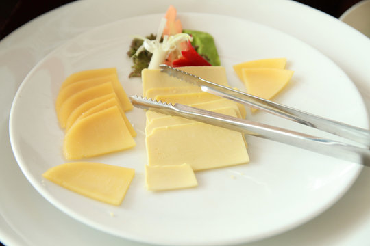 sliced of cheese at buffet breakfast