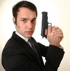 Businessmann mit Pistole
