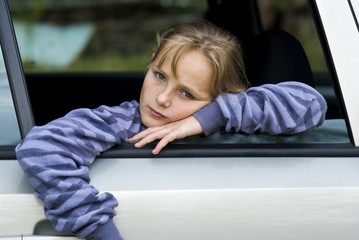 Sad girl in car