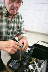 Portrait d'un ouvrier sur son lieu de travail