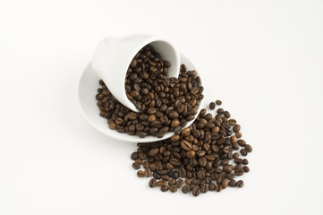 Fototapeta na wymiar coffee beans with a cup