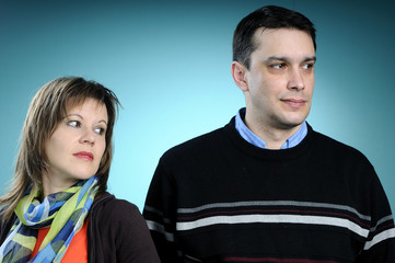 upset couple in family conflict