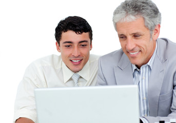 Fototapeta na wymiar Two businessmen working at a computer