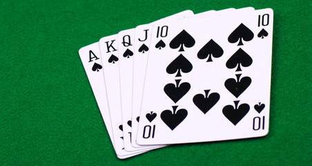 Closeup of rolal flush spades