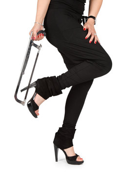 woman trying to saw off her heel