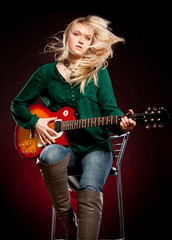 Fototapeta premium girl with a guitar
