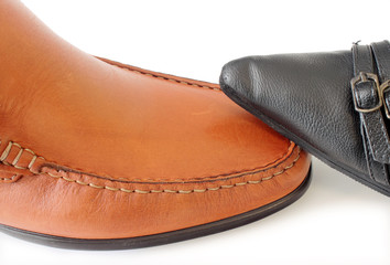 Male and female shoes isolated on white.