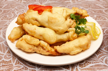 Roast fish in dough on a plate
