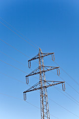 electricity high voltage tower with blue sky