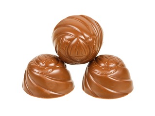 Three chocolates isolated on a white background
