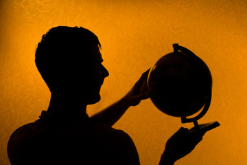 Hold the World - silhouette of man