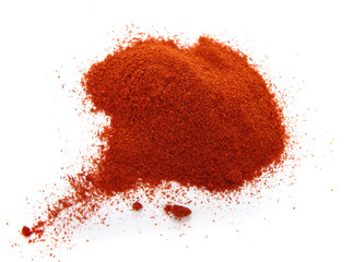 food spice pile of red ground PAPRIKA on white - 21023218