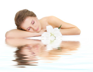 Obraz na płótnie Canvas beautiful woman sleeping over white