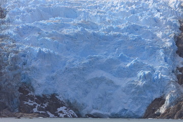 Glacier in Lemaire Chanel in Antarctica seen from a sailing boat