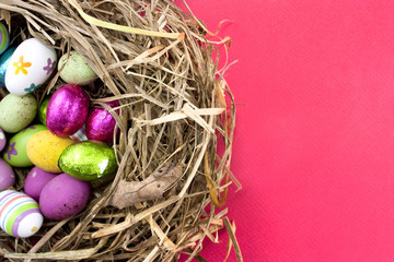 easter eggs in nest on red