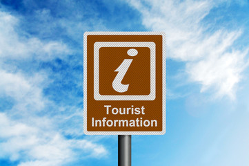 Tourist Information Centre sign against blue sky