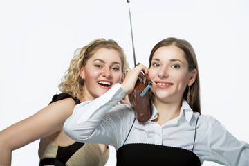 happy girlfriends with radio isolated over white background