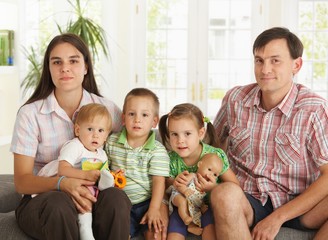 Portrait of nuclear family at home
