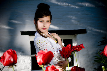 Teenage fashion girl with red poppies