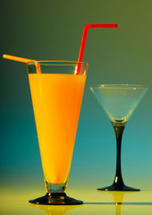 glass with drink on the yellow background