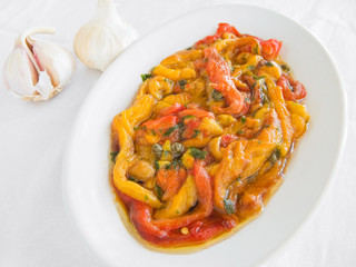 Roasted Bell Pepper Salad on white dish.