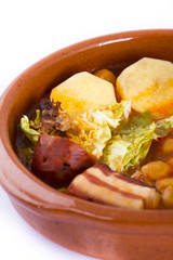 Madrid stew on earthenware pot, spanish food