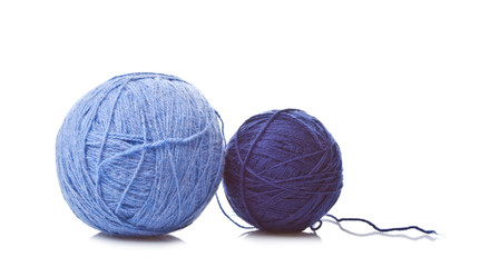 two Balls of blue wool isolated on a white background