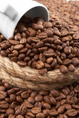 Cup in a grain of coffee