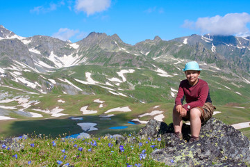 Hiker in Caucasus mountains