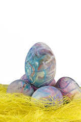 Colorful easter eggs on synthetic grass