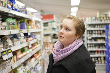 Shopping - Pretty young woman in supermarket