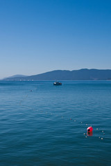 Orange Float on Blue Water