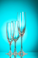 Wine glasses against colourful background